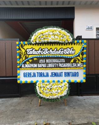 Papan Bunga Duka di Sanding